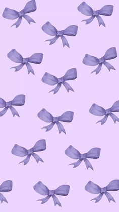 many purple bows on a light pink background