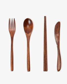 wooden utensils and spoons on a white background