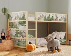 a child's bedroom with two bunk beds and an animal themed wallpaper on the walls