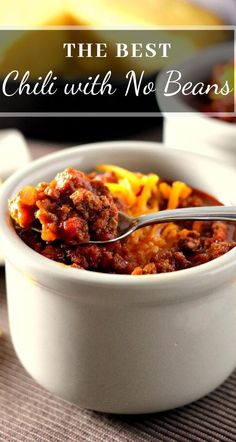 the best chili with no beans recipe in a white bowl on a brown tablecloth