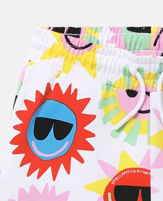 Playful Graphic Print Shorts For Summer, Playful Graphic Print Summer Shorts, Playful Beach Shorts, Playful Yellow Summer Shorts, Playful Summer Shorts, Fun White Shorts For Beach, Fun White Bottoms For Vacation, Fun White Beach Shorts, White Fun Style Vacation Bottoms