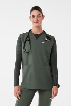 Why We Love ThisDesigned for your messiest shifts. Our V-Neck FREEx Sleeveless ScrubSmock™ provides added protection and features a relaxed cut to layer over your scrubs easily.
Model Fit Description
Model is 510' / Wearing XS

Total of three pockets 
One chest pocket
Two drop pockets at hip
V-neck
Side slits
Jacquard labels at chest and hip pocket

Engineered with Technical Comfort™







CONTENT & CARE
Features our proprietary FREEx™ fabric is engineered from 92% recycled Polyester, is ultra- Spa Scrubs, Pretty Uniform, Titan Aesthetic, Hair Water, Attack On Titan Aesthetic, Scrub Life, Low Low, Model Fits, Scrub Tops