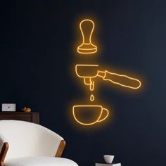 a yellow neon light is shining on the wall next to a white chair