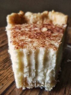 a piece of cake sitting on top of a wooden table