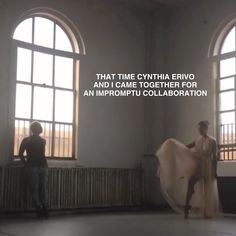 a man and woman are dancing in an empty room with large windows that read, that time cyntha evvo and i came together for an imppomuu collaboration