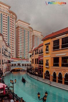 a canal in the middle of some buildings