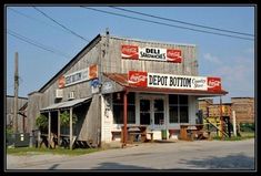 an old building with some signs on it