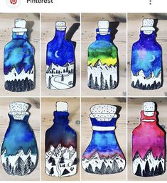 the bottles are painted with watercolors and have mountains on them, while stars in the sky shine brightly