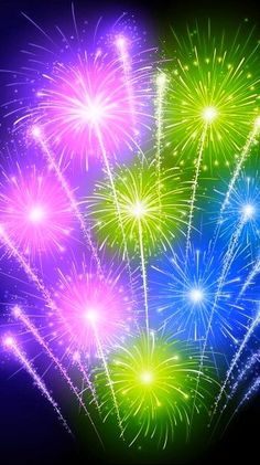 colorful fireworks are lit up in the night sky with bright colors and sparkles on them