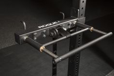 the squat station is equipped with heavy duty barbells and pulley attachments