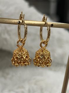 gold plated micro  jhumki earrings on hoops, Indian style  earrings. it doesn't get any smaller.  Cutes pair of Indian fusion earrings.  Earrings dangle 1 inches long and are super light. perfect for everyday wear.  These beauties are for pierced ears, they are not clip on style. Cheap Traditional Brown Earrings, Gold Plated Dangle Jhumkas With Latkans, Gold Plated Jhumkas With Latkans, Festive Brass Hoop Earrings With Latkans, Gold Hoop Earrings With Latkans For Festivals, Traditional Small Hoop Gold Plated Earrings, Bollywood Dangle Hoop Earrings, Festive Gold Hoop Earrings With Latkans, Gold Small Hoop Earrings For Festive Occasions