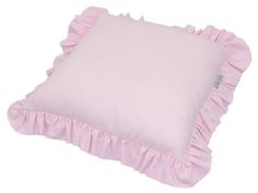 a pink pillow with ruffled edges on a white background