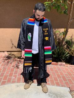 Beautiful Embroidered 2024 Graduation sash stole. This is the perfect touch for every 2024 Graduate. This makes a perfect gift if your loved one. This is made of the Mexican serape to represent your culture as you are walking on stage. This sarape stole can be used for your graduation pictures, graduation ceremony, and graduation party. This sarape stole includes "CLASS OF 2024" embroidered on one side. On the other side includes embroidered San Judas. Customization not available on this stole. Mexican Sarape, Pictures Graduation, 2024 Graduate, Graduation Sash, Mexican Serapes, Graduation 2024, 2024 Graduation, Class Of 2024, Graduation Ceremony