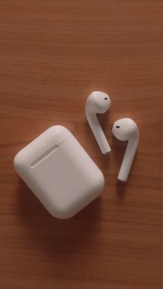 White AirPods 
White case
Brown table
Aesthetic AirPods Phone And Earphones Aesthetic, Airpods Aesthetic Wallpaper, Airpods 2 Aesthetic, Earphone Aesthetic, Airpod Aesthetic, Deepavali Message, Headphone Collection, Earphones Aesthetic