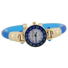 100% Authentic Murano Glass CONTACT ADD US FEEDBACK ABOUT US OUR STORE Best Seller Great Service Fast Shipping 24h  100% Satisfaction Guarantee Murano Glass Millefiori Bangle Watch - Blue   US $199.95  US $99.95   BUY › Watch Item ‹ › Ask a Question ‹   AUTHENTIC MURANO: Genuine Italian Murano Glass hand-made in Venice, Italy. UNIQUE: Each piece is crafted entirely by hand using ancient glass-making techniques. No two pieces are exactly the same. MEASUREMENTS: Diameter approximately 1". ITALIAN CRAFTSMANSHIP: Made in one of the oldest workshops on Murano Island in Venice, Italy by masters whose lineage in glass craftsmanship goes centuries back. Certificate of Authenticity included. BEAUTIFUL PRESENTATION: This Murano Glass accessory and every item in our Murano Glass Jewelry Collection co Trendy Blue Watch For Gift, Blue Watches With Bracelet Strap As Gift, Buy Watch, Murano Glass Earrings, Italy Jewelry, Murano Glass Jewelry, Italian Bags, Glass Bangles, Bangle Watches