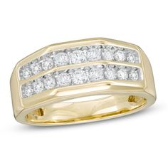 a men's diamond ring in yellow gold