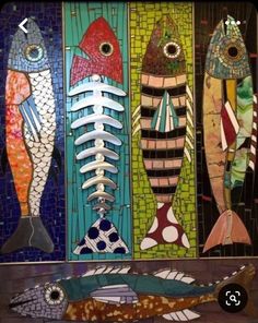 three fish are on display in front of a mosaic tile wall with the words, 3 fish