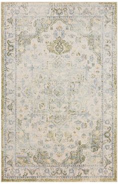 an area rug with blue, green and beige colors on the bottom half of it