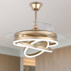 a modern ceiling light in an empty room