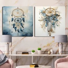 two paintings on the wall in a living room