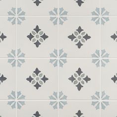 a white and blue tile with black and grey designs