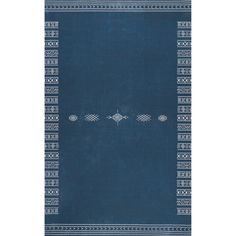 a blue rug with white and black designs on it