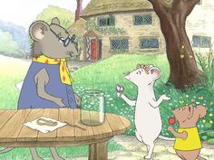 two mice are sitting at a picnic table and one mouse is holding something in his hand