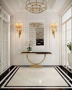 a room with white walls and black and white striped flooring that has a gold table in the center