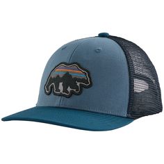 the patagon trucker hat in blue has a bear embroidered on the front