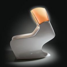 a white chair with an orange seat on top of it's backrests