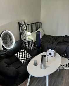 a living room with black and white decor