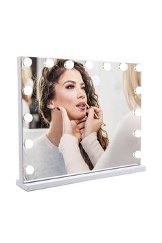 This makeup mirror is a valuable addition to your facial lighting, featuring a Hollywood-style design and a modern minimalist approach tailored to meet the demands of contemporary living. Equipped with 15 eco-friendly LED bulbs that emit soft, adjustable lighting, this mirror empowers you to observe facial details with utmost clarity. With a frameless structure that eliminates any gaps and a sleek white finish, this mirror artfully combines simplicity and elegance, infusing your space with a touch of sophistication. Freestanding Mirrors, Hollywood Style, Makeup Mirrors, M Beauty, Hollywood Fashion, Adjustable Lighting, Isle Of Wight, Contemporary Living, Makeup Mirror