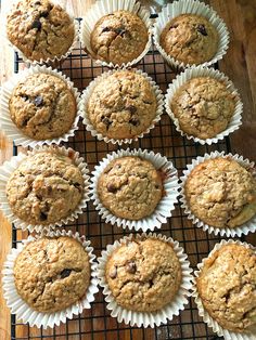 muffins cooling on a wire rack in paper cups