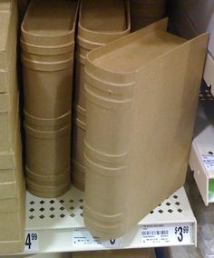 several stacks of cardboard stacked on top of each other