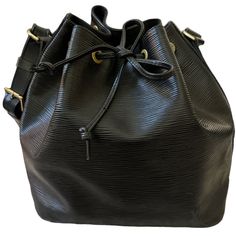 Brand Louis Vuitton Style Bucket Bag W/ Original String. Material Epi Leather Color Black Made In France Original Hardware, Shoulder Strap And String. Lv Bag Included. Measurements Bag Bottom10”X7.5”/ Height 7.75”/ Shoulder Drop 10” It’s Adjustable, Can Be Made Longer. Slightly Signs Of Use According To Age. No Stains Or Smell On Interior Condition Very Good Condition. No Rips Or Stains. No Tarnish On Hardware, Hardware Still Beautiful Gold. Slightly Rubbing On Corners See Last Photos For Details. Leather Bucket Bag, Leather Bucket, Lv Bag, Louis Vuitton Bag, Made In France, Bucket Bag, Black Color, Shoulder Strap, Bag Lady