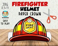 firefighter helmet paper crown cutout on wooden table with scissors and clippings