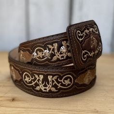 Bota Exotica - Western Embroidered Belt for Men / Cinturones Vaqueros Bordados para Hombre The price includes sales tax and shipping cost within the United States / El precio incluye impuestos de venta (Sales Tax) y costo de envio dentro de Estados Unidos Description of Western Belt for Men / Descripcion de el Cinturon Vaquero para Hombre: Western embroidered belt for men and women with genuine cow hair on belt. Made in Mexico. / Cinturón bordado vaquero para hombres y mujeres con pelo de vaca g Vaquera Outfit Mexican, Western Belts For Women, Mexican Clothing, Brown Cafe, Mexican Outfit, Embroidered Belt, Belt For Men, Denim Belt