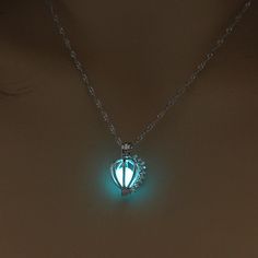 Glow In The Dark Pumpkin Crown Necklace Available in colors: Blue, Green and Aqua. Can be worn throughout the day. A brilliant gift idea In order to get the best result, place the necklace directly into sunlight or under a light source (UV flashlight, white bulb etc) should get you a beautiful glow. When fully charged it will glow brightly for the first 40 minutes and after that it fades out slowly in the following hours. For easy to use, you can charge by your smart phone app "flashlight" so you can charge it up again in a matter of seconds when the glow wears out. UV light or natural sunlight works best for any glow in the dark product. Dark Jewelry, Crown Necklace, Stone Choker, Tarnished Jewelry, Flower Hair Accessories, Long Pendant Necklace, Long Pendant, Crystal Necklace Pendant, Fashion Accessories Jewelry