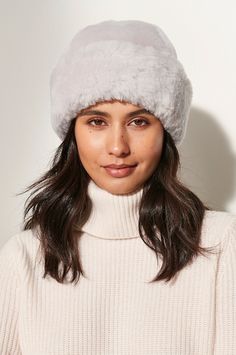 Conquer the winter chill with this timelessly stylish and incomparably warm winter hat. Made of dense, silky mouton shearling sheepskin, this elegant hat lends luxurious warmth to your winter wardrobe, while giving you a classic look from day to night. The rolled brim allows you to adjust over your ears, while satiny polyester lining ensures a nice fit. Frame your face in luxury! Winter Hats For Women Cold Weather, Cossack Hat, Hats Cowboy, Elegant Hat, Sheepskin Gloves, Crochet Winter Hats, Fur Hats, Warm Winter Hats, Elegant Hats