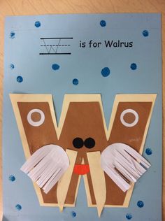 a paper cut out of the letter w is for walrus