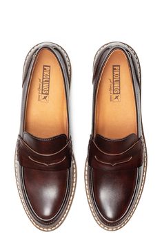 A colorblock design plays up the cool, classic style of this lightly cushioned penny loafer. 1 1/4" heel Cushioned footbed Leather upper/synthetic and textile lining/synthetic sole Imported Classic Brown Platform Loafers With Removable Insole, Classic Brown Platform Loafers With Brogue Detailing, Brown Wingtip Loafers With Cushioned Footbed, Best Loafers, Classic Loafers, Footwear Fashion, Loafer Women, Beautiful Style, Penny Loafer