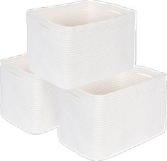 three white storage baskets stacked on top of each other