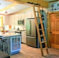 a ladder is hanging from the ceiling in a kitchen