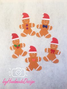 six gingerbread cutouts with santa hats and bow ties on them, arranged in a circle