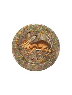 a brown and green plate with a rabbit on it