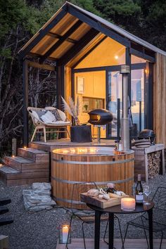 an outdoor hot tub in the middle of a patio