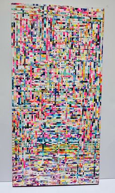 an abstract piece of art made out of colorful squares