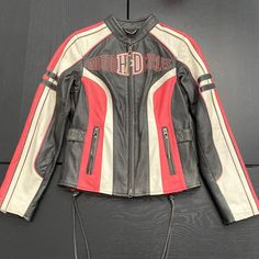 Harley-Davidson Women’s Ridgeway Black White And Pink Leather Jacket. Beautiful Harley-Davidson Pink, Black, And White Leather Riding Jacket. Stunning Laced Side Details. Worn Only One Time. Great Condition. Great Quality. Size Xs, True To Size, Measurement Shown In Photos. Limited Edition Seasonal Item - Super Rare! Baggy Leather Jacket, Harley Jacket, Leather Riding Jacket, Harley Davidson Leather Jackets, Cafe Racer Leather Jacket, Harley Davidson Clothing, Motorcycle Jacket Women, Leather Coat Womens, Casual Leather Jacket