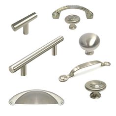 an assortment of handles and knobs on a white background