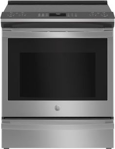 a stainless steel oven with the door open and an electronic display on it's side